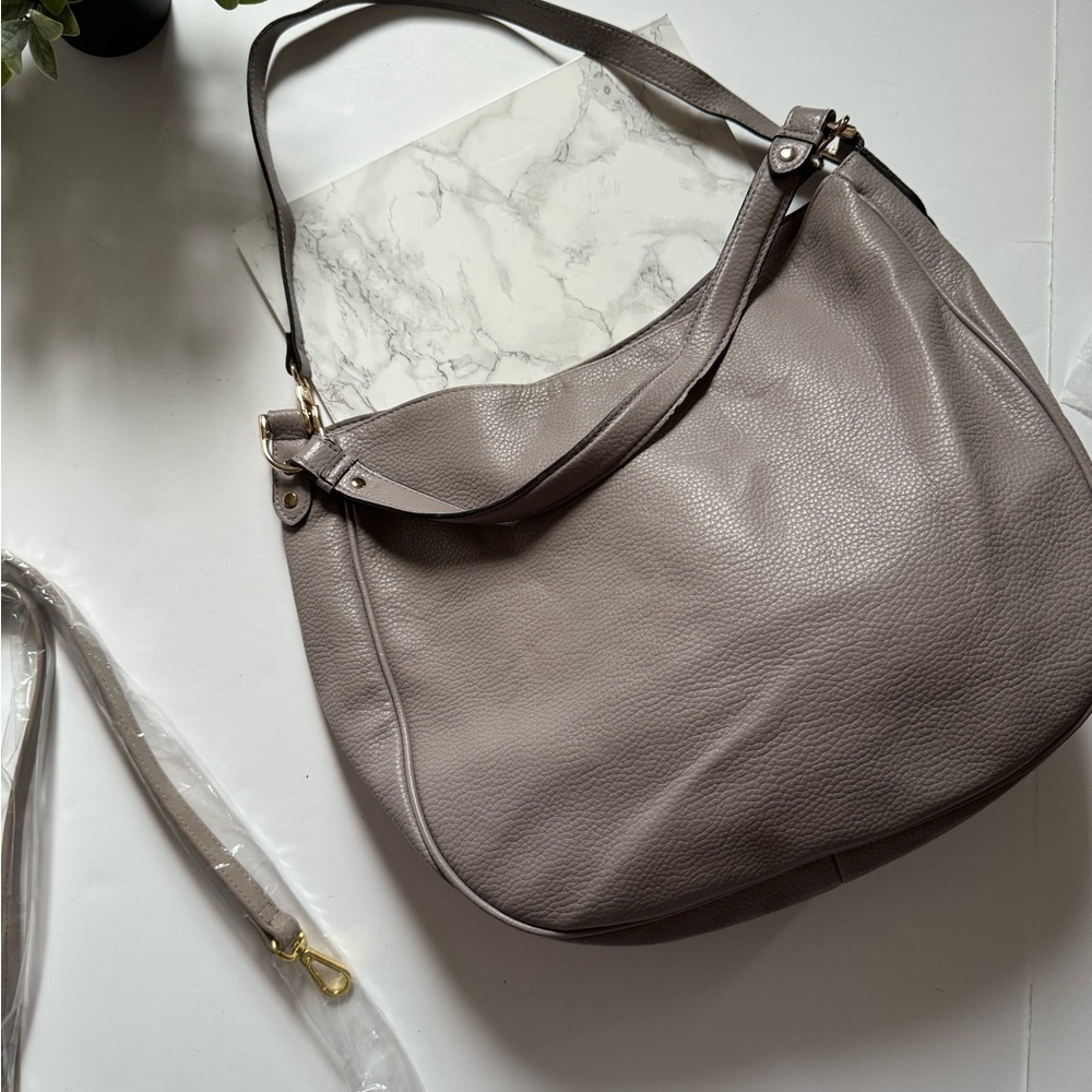 Merona shoulder bag with crossbody strap.